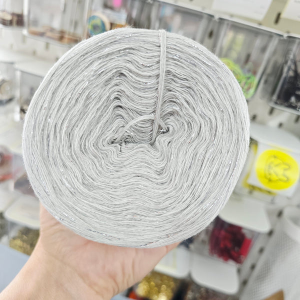 WDL 12+21 Melange DeLux Yarn Cake Woolcot Extrafine